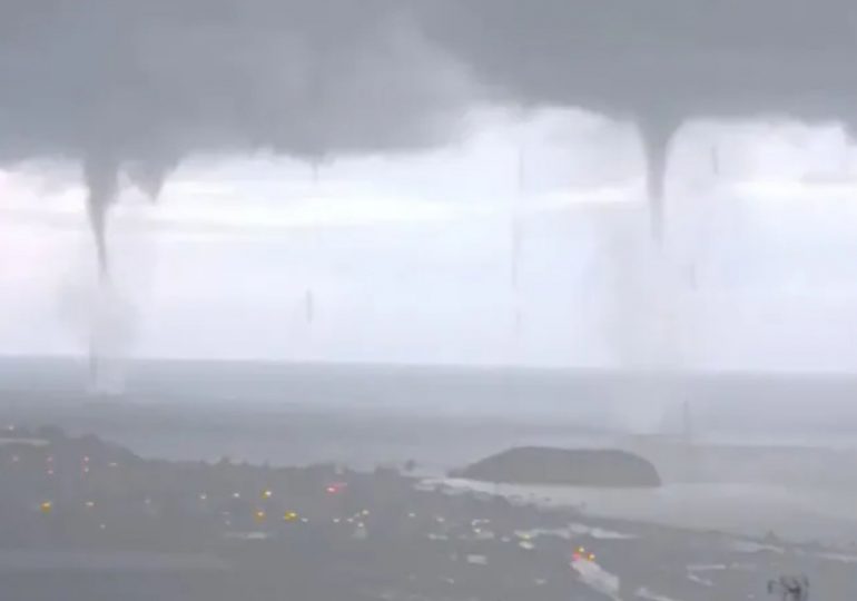 Moment THREE waterspout tornados strike at the same time off the coast of Spain in freak natural event