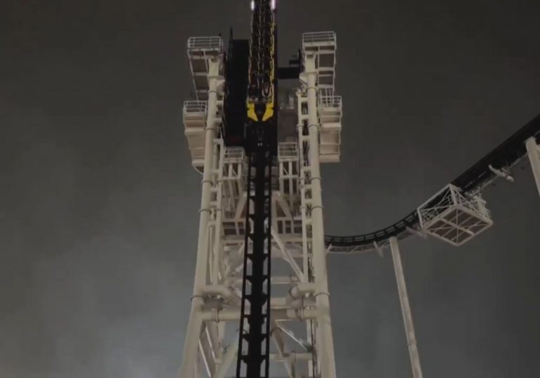 Two men left dangling 100ft in the air after brand new ‘tilt’ rollercoaster malfunctions as frantic relative calls 911