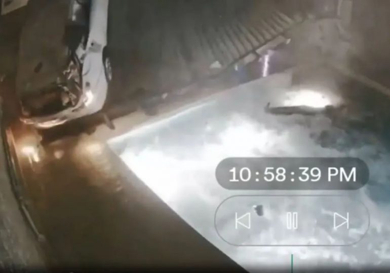 Heart-stopping moment out-of-control car goes airborne and crashes through garden flinging driver into swimming pool