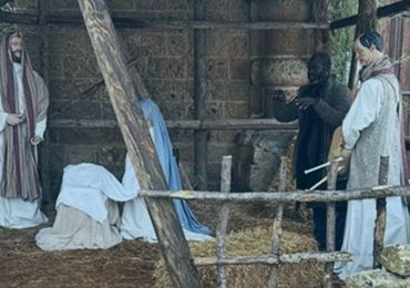Bizarre moment migrant fugitive is found pretending to be a statue in nativity scene by mayor who happened to be passing