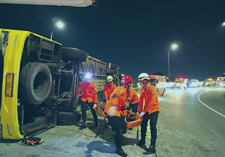 At least 16 killed after bus loses control and smashes into barrier on popular tourist route in Indonesia