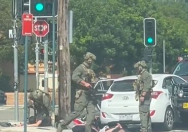 Heavily armed cops ram car in Sydney ‘and arrest five’ with city on edge in wake of Bondi terror attack