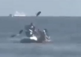 Shocking moment couple in kayak are attacked by jet ski thieves with an oar as crims steal wedding rings in beach heist