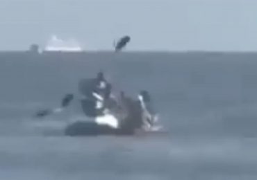 Shocking moment couple in kayak are attacked by jet ski thieves with an oar as crims steal wedding rings in beach heist