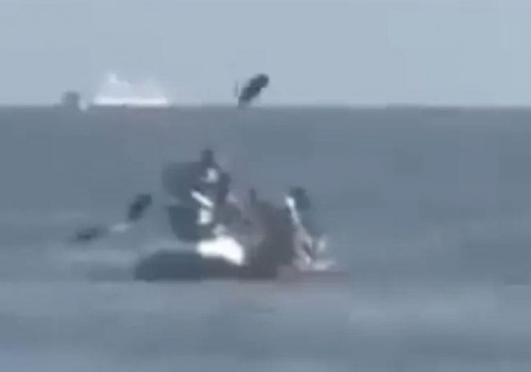 Shocking moment couple in kayak are attacked by jet ski thieves with an oar as crims steal wedding rings in beach heist
