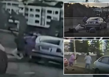 Horrific moment hero bystander couple desperately try to disarm Bondi gunman – but are shot dead as massacre erupts
