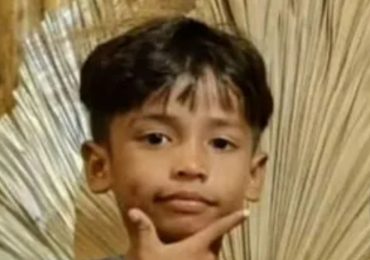 Tragic boy, 10, is mauled to death by crocodile after going for a swim in river with pals