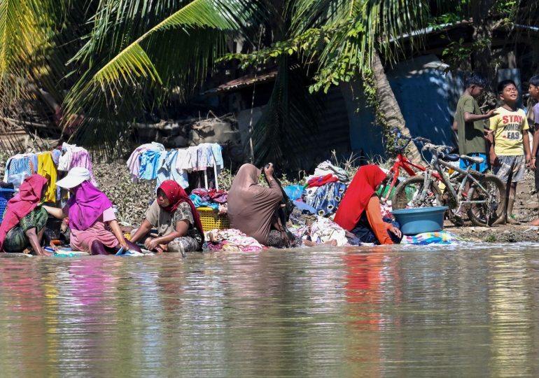 Death toll soars to over 1,000 in devastating floods as military deployed after two storms ravage 4 nations across Asia