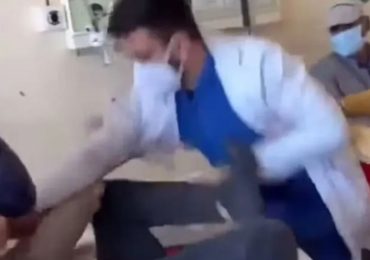 Shocking moment doctor repeatedly punches patient lying on bed after victim asked to be spoken to with respect