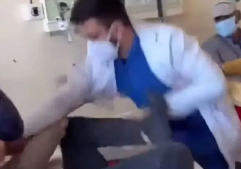 Shocking moment doctor repeatedly punches patient lying on bed after victim asked to be spoken to with respect