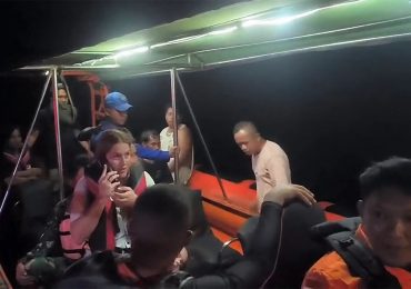 Family of four missing as tourist boat sinks in rough seas after being battered by monster 10ft waves