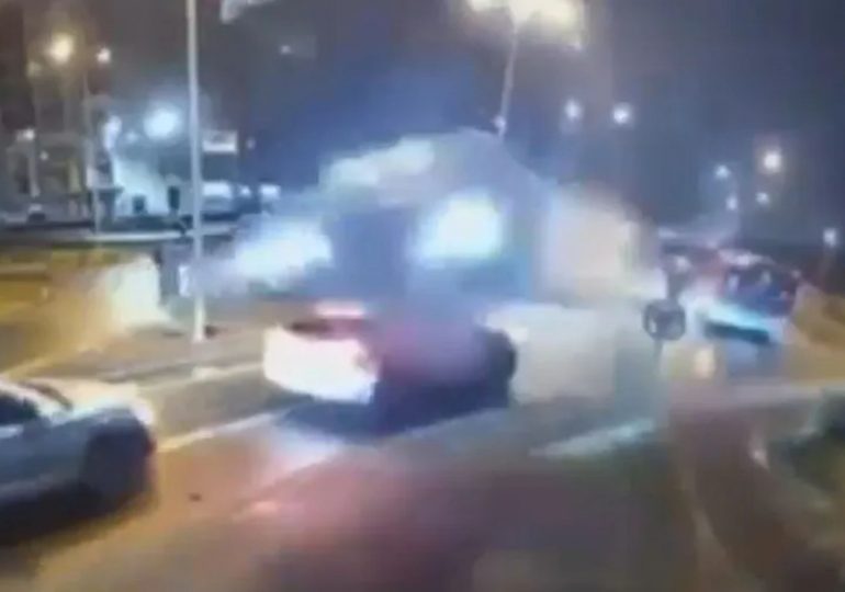 Terrifying moment speeding Mercedes is catapulted into the air and jumps over two cars after hitting roundabout