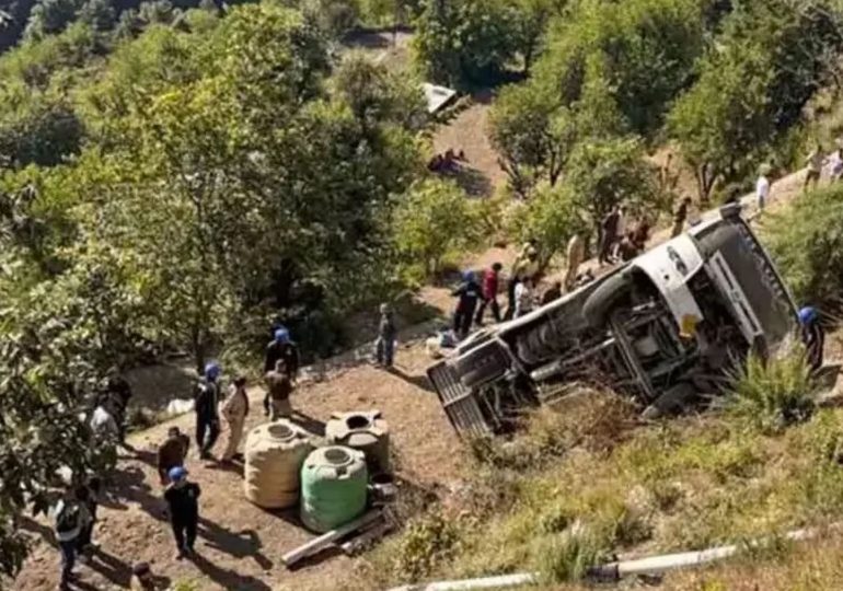At least five passengers dead after bus carrying tourists plunges into 230ft gorge as desperate rescue effort launched