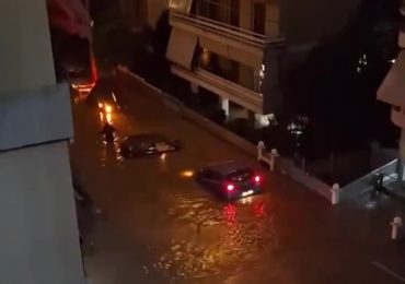 Flooding swamps Greek holiday hotspot as Athens is battered by storm and deluge leaves people trapped in their homes