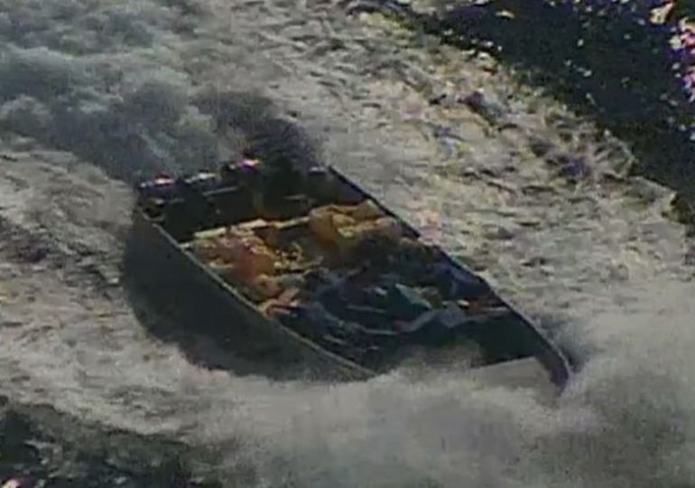 Moment US sniper opens fire on narco boat before seizing massive haul of cocaine