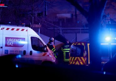 Two children dead after massive explosion in apartment building as four more injured and another two buried under rubble