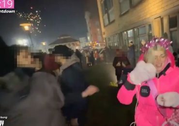 Shocking moment influencer is attacked TWICE & hit with ‘firework’ as wild NYE street parties descend into total anarchy