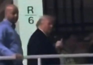 Watch as Trump gives middle finger to ‘lunatic’ car factory worker who called president a ‘paedo protector’ over Epstein