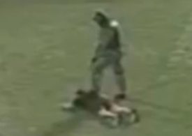 Horror moment killers dressed as cops storm football match before opening fire and killing three
