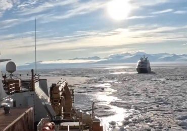 Incredible moment stranded 200-passenger Arctic cruise liner is saved by US icebreaker that carved path for frozen ship