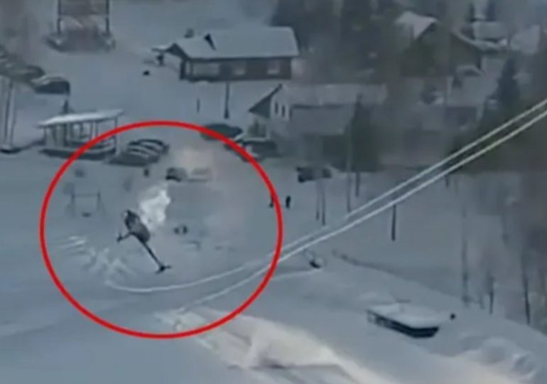 Horrifying moment helicopter CRASHES after getting tangled up in ski lift cables at resort killing two