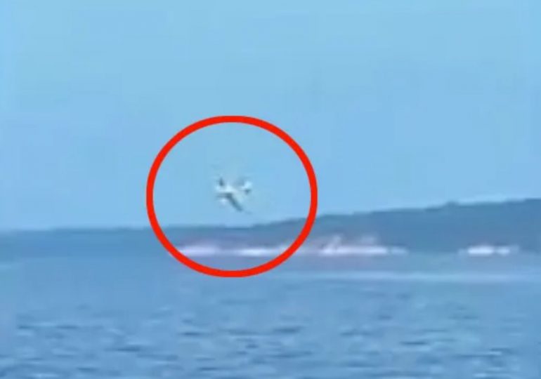 Horror moment plane NOSEDIVES into river and smashes into pieces leaving pilot and passenger injured
