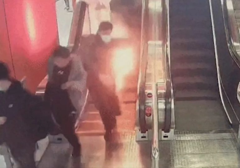 Horror moment terrified commuter is engulfed in flames after power bank EXPLODES in his pocket at busy metro station