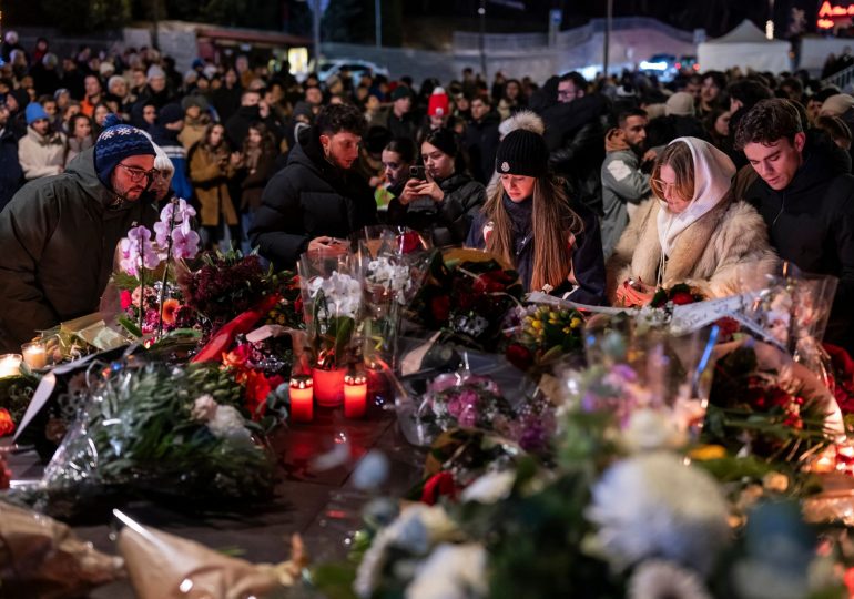 Parents are desperately searching for children after Swiss ski resort inferno as hundreds gather for heartbreaking vigil