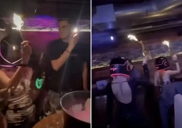 Eerie vid from Swiss bar shows staff carrying flaming champagne bottles before deadly inferno that killed at least 47