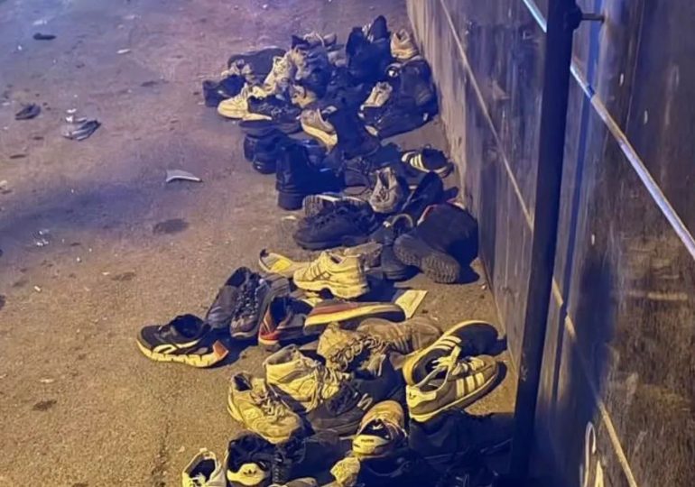 Haunting picture shows abandoned shoes after Iran burned surrendering protesters to death inside a bazaar