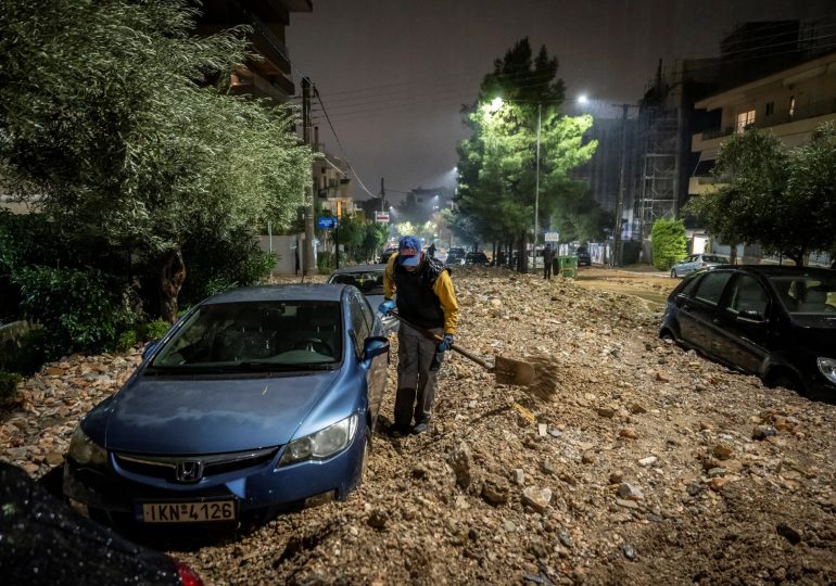 Woman is killed by car swept away in horror floods as historic European city is drenched by storm and emergency declared
