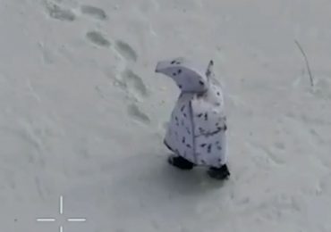 Shocking moment another Russian ‘penguin’ soldier is blown up on the battlefield while wearing bizarre anti-drone camo