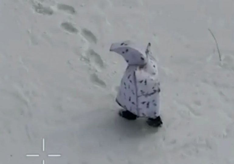 Shocking moment another Russian ‘penguin’ soldier is blown up on the battlefield while wearing bizarre anti-drone camo