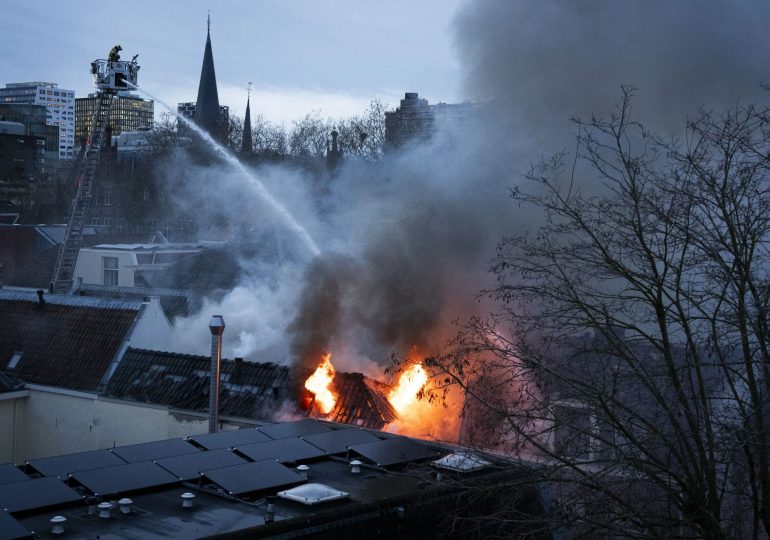 Huge blast destroys several buildings and leaves fire raging as four injured & fears of more buried under rubble
