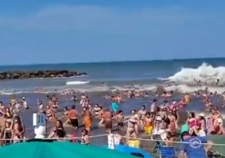 Horror moment deadly ‘meteotsunami’ smashes busy beach as freak ‘30ft wave surge’ kills at least one and injures dozens