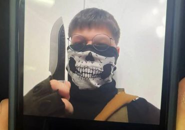 Masked boy, 13, ‘launches knife rampage on school leaving cleaner wounded after posting terrifying pic online’