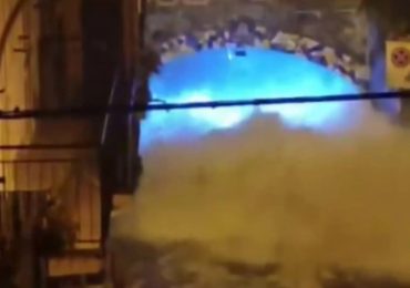 Shocking moment locals run for their lives as streets flood in an INSTANT on Italian holiday island battered by cyclone