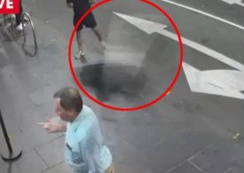 Shocking moment man is floored after being struck by a flying chair outside strip club as he’s being kicked out of venue