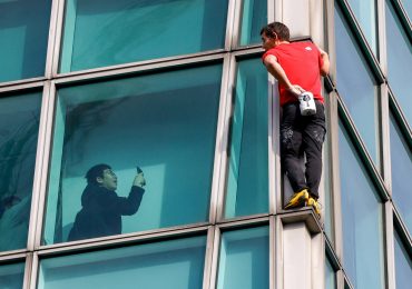 Moment rock climber reaches top of 101-story tower in Taiwan without ropes in daring Netflix challenge