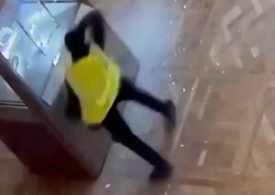 Dramatic CCTV footage shows the moment brazen thief smashes display case in Louvre in £76million crown jewel heist