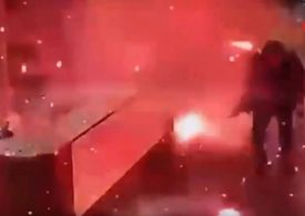 Terrifying moment parcel explodes in apartment reception just after being delivered to desk as two injured