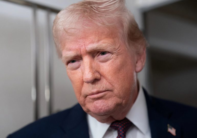 Trump pledges to slap 25% tariff on any country trading with Iran as he backs brave protesters fighting Ayatollah