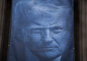 ‘Beyond Parody’: Democrats Criticize Giant Trump Banner Hung at Justice Department Headquarters