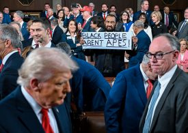 Rep. Al Green Removed From Trump’s State of the Union After Protesting With ‘Black People Aren’t Apes’ Sign