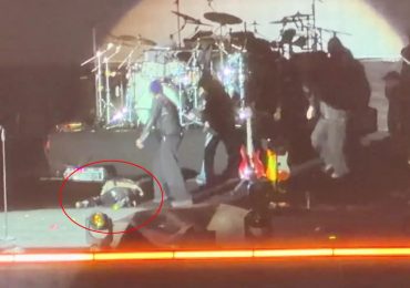 Shocking moment singer collapses on stage at music festival after belting out hit record & is rushed to hospital