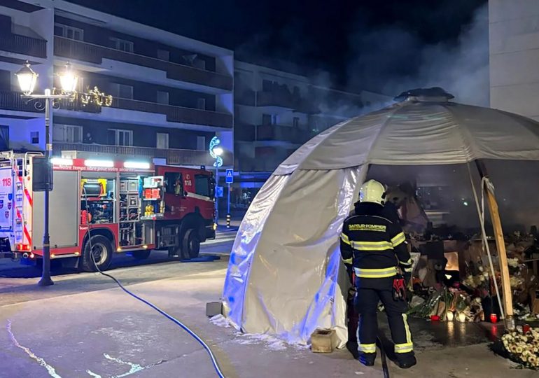 Memorial for victims of Swiss bar fire goes up in flames after tent was filled with candles and flowers for 41 killed