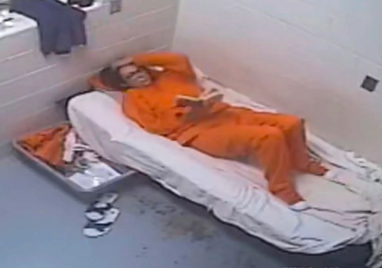 Watch as Ghislaine Maxwell paces in cell and scoffs prison food in grim jailhouse CCTV footage released in Epstein files