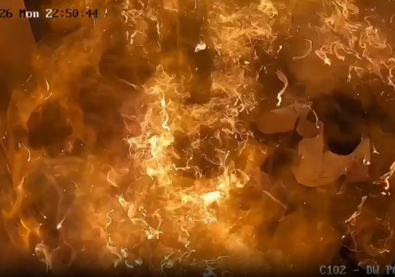 Horror moment bunch of balloons filled with explosive gas burst in giant fireball inside lift engulfing people in flames