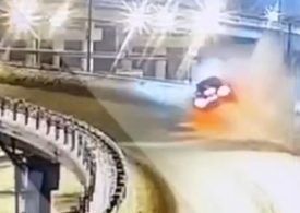 Horrifying moment speeding Mercedes smashes through flyover barrier and plunges 35ft onto car below leaving two dead