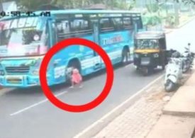 Heartstopping CCTV shows toddler run out onto busy road – as bus hurtles right towards her